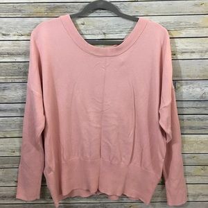 Cute sweater top with button down the back